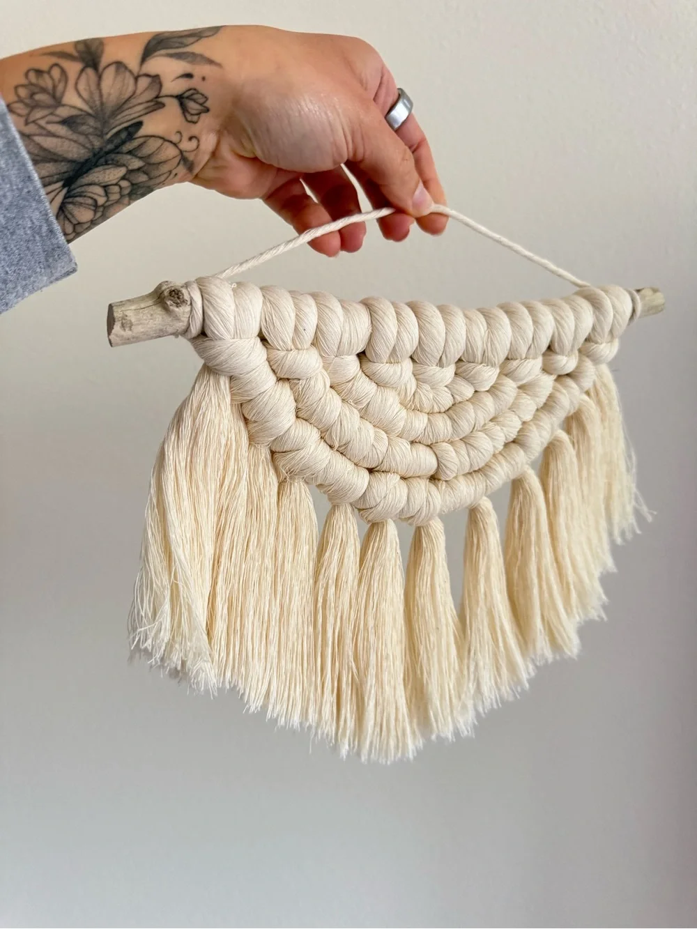 Boho style cream colored macrame wall hanging